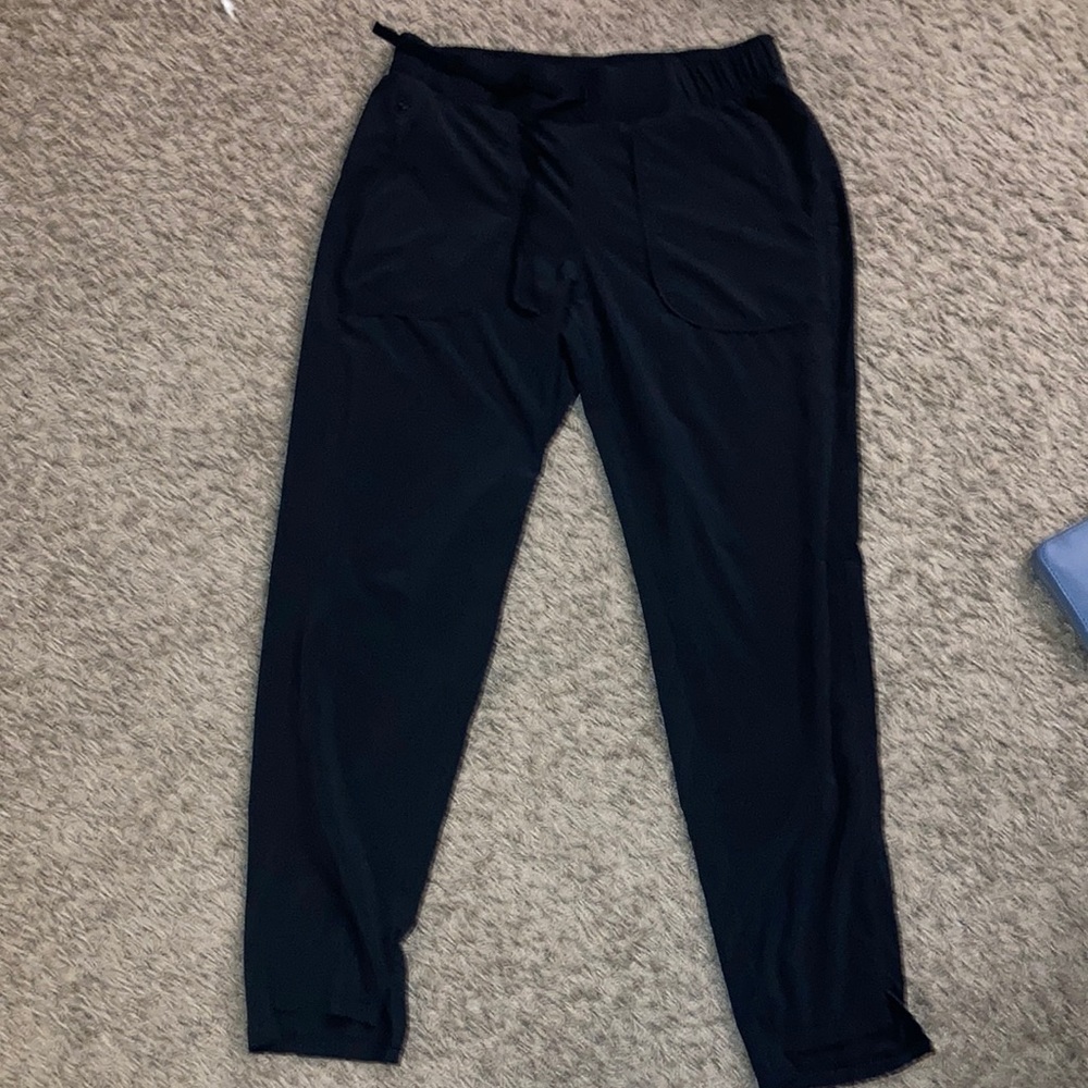 Black dry-fit sweatpants, loose fitting